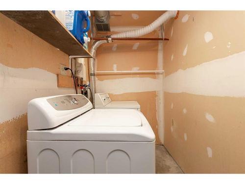 202 Jerry Potts Boulevard West, Lethbridge, AB - Indoor Photo Showing Laundry Room