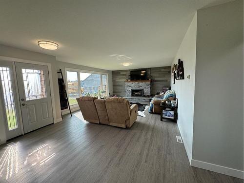 265019B Twp Rd 74, Fort Macleod, AB - Indoor Photo Showing Living Room With Fireplace