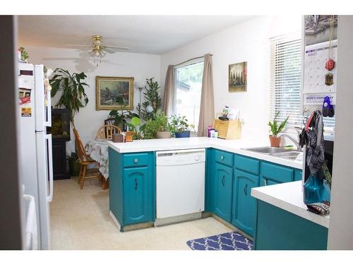 2301 16 Street North, Lethbridge, AB - Indoor Photo Showing Kitchen With Double Sink