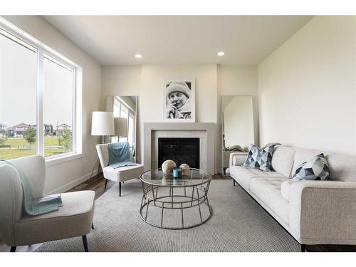 541 Malahat Green West, Lethbridge, AB - Indoor Photo Showing Living Room With Fireplace