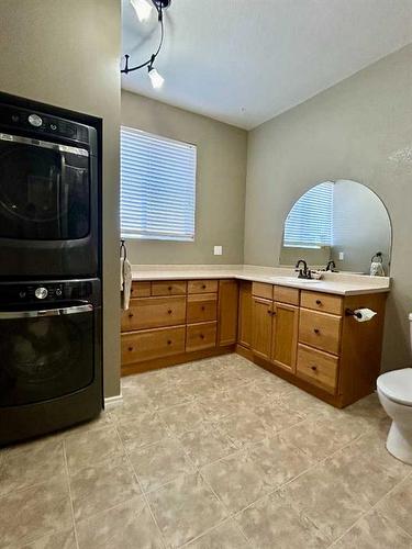 123075 843 Highway, Picture Butte, AB - Indoor Photo Showing Laundry Room