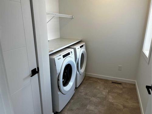 2504 45 Street South, Lethbridge, AB - Indoor Photo Showing Laundry Room