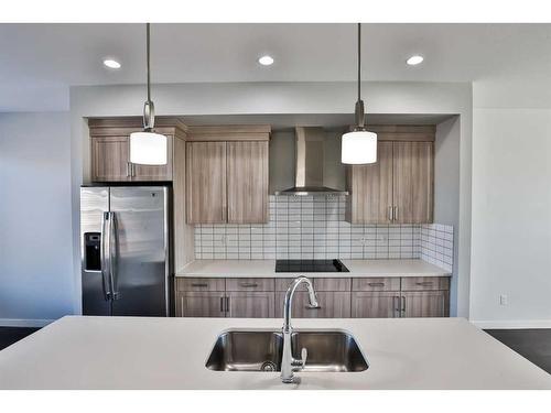 1017 Alice Birch Point North, Lethbridge, AB - Indoor Photo Showing Kitchen With Double Sink