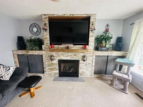 630 10 Street, Fort Macleod, AB - Indoor Photo Showing Living Room With Fireplace