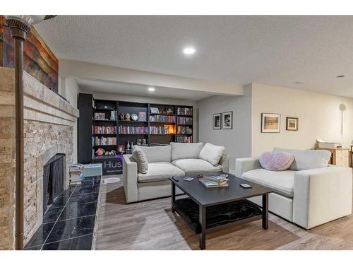 1505 Cedar Place South, Lethbridge, AB - Indoor Photo Showing Living Room With Fireplace