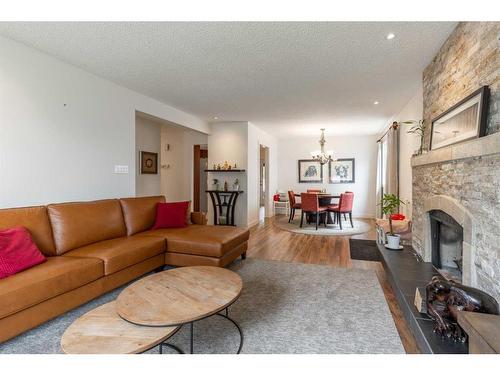 1505 Cedar Place South, Lethbridge, AB - Indoor Photo Showing Living Room With Fireplace