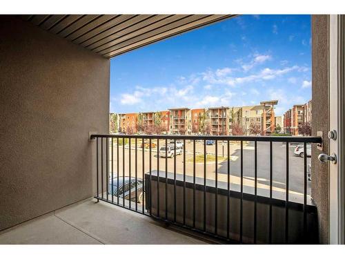 9208-403 Mackenzie Way Sw, Airdrie, AB - Outdoor With Balcony With Exterior