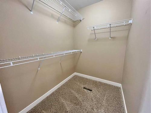 188 Riverstone Boulevard West, Lethbridge, AB - Indoor With Storage