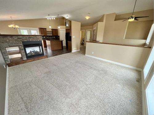 188 Riverstone Boulevard West, Lethbridge, AB - Indoor With Fireplace