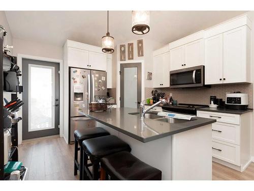 882 Greywolf Run North, Lethbridge, AB - Indoor Photo Showing Kitchen With Double Sink