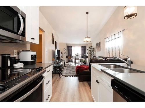 882 Greywolf Run North, Lethbridge, AB - Indoor Photo Showing Kitchen With Double Sink