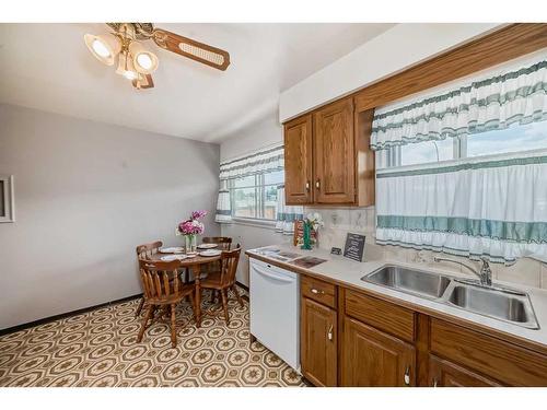 1513 9 Avenue North, Lethbridge, AB - Indoor Photo Showing Kitchen With Double Sink