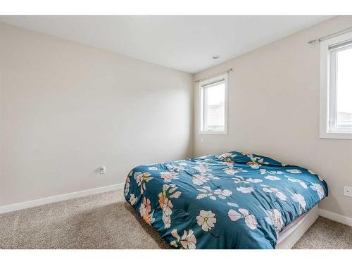 417 Sundance Place, Coalhurst, AB - Indoor Photo Showing Bedroom