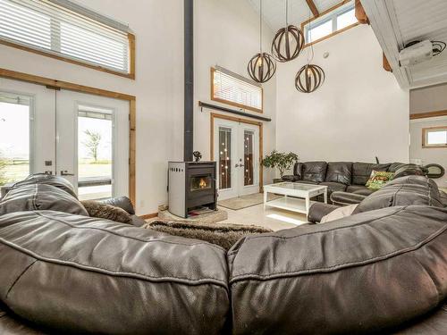 335 Avro Anson Road, Fort Macleod, AB - Indoor Photo Showing Living Room With Fireplace