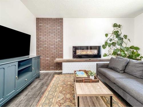 1803 22 Street South, Lethbridge, AB - Indoor Photo Showing Living Room With Fireplace