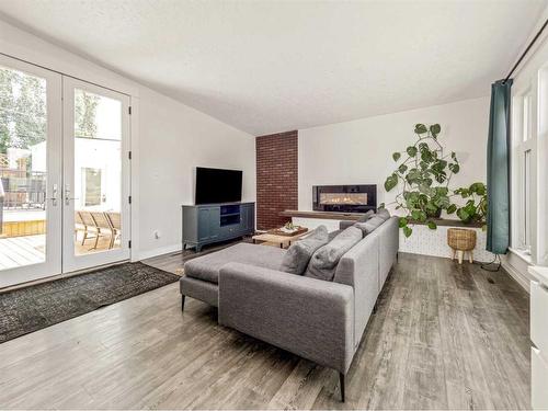 1803 22 Street South, Lethbridge, AB - Indoor Photo Showing Living Room With Fireplace