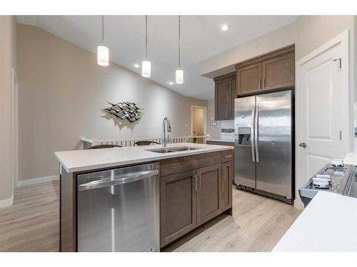 4-53 Aquitania Circle West, Lethbridge, AB - Indoor Photo Showing Kitchen With Double Sink