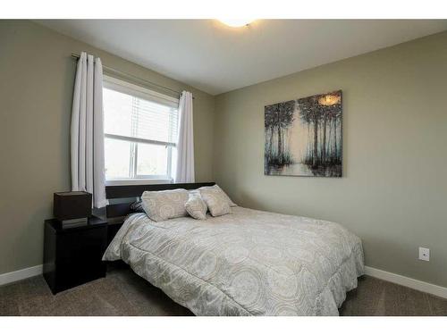 466 Mt Sundance Landing West, Lethbridge, AB - Indoor Photo Showing Bedroom