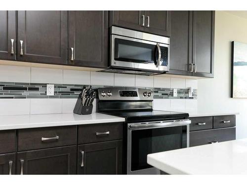 466 Mt Sundance Landing West, Lethbridge, AB - Indoor Photo Showing Kitchen With Upgraded Kitchen