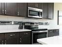 466 Mt Sundance Landing West, Lethbridge, AB  - Indoor Photo Showing Kitchen With Upgraded Kitchen 