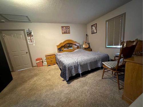 5402 44 Avenue, Taber, AB - Indoor Photo Showing Bedroom