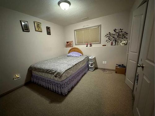 5402 44 Avenue, Taber, AB - Indoor Photo Showing Bedroom