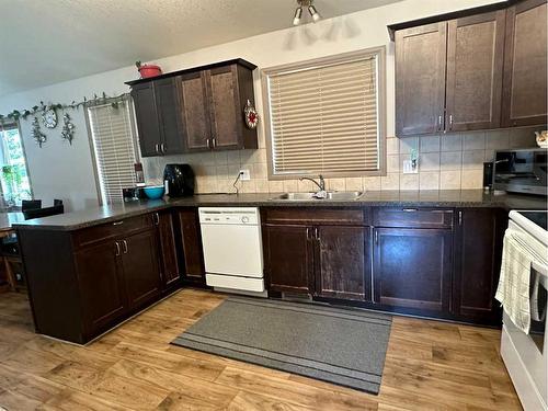 5402 44 Avenue, Taber, AB - Indoor Photo Showing Kitchen With Double Sink