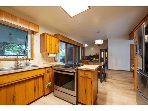 1110 10 Street South, Lethbridge, AB - Indoor Photo Showing Kitchen With Double Sink