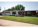 1110 10 Street South, Lethbridge, AB  - Outdoor With Deck Patio Veranda With Facade 