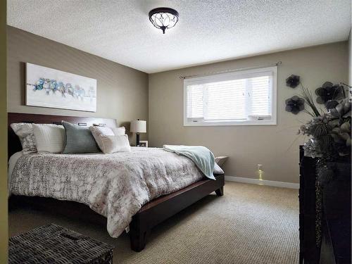 3805 Redwood Road South, Lethbridge, AB - Indoor Photo Showing Bedroom