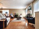 3805 Redwood Road South, Lethbridge, AB  - Indoor Photo Showing Living Room With Fireplace 