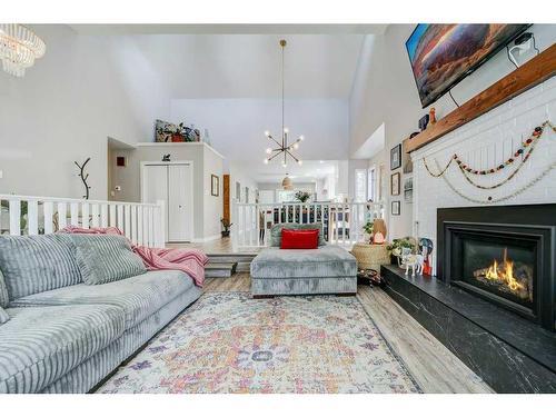 31 Erminerun Place North, Lethbridge, AB - Indoor Photo Showing Living Room With Fireplace