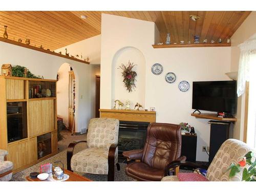 100 4Th Street, Picture Butte, AB - Indoor With Fireplace