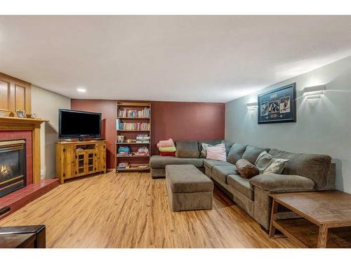 51 Wildwood Crescent West, Lethbridge, AB - Indoor Photo Showing Living Room With Fireplace