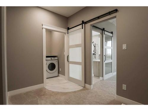 213 Greenwood Road, Coalhurst, AB - Indoor Photo Showing Laundry Room