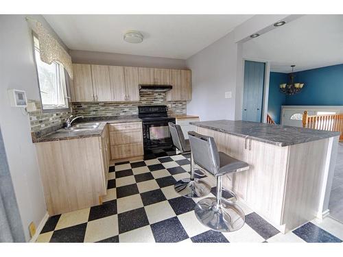 426 12 Avenue North, Lethbridge, AB - Indoor Photo Showing Kitchen With Double Sink