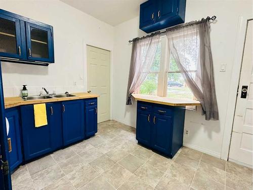 301 Noble Street, Barons, AB - Indoor Photo Showing Kitchen With Double Sink