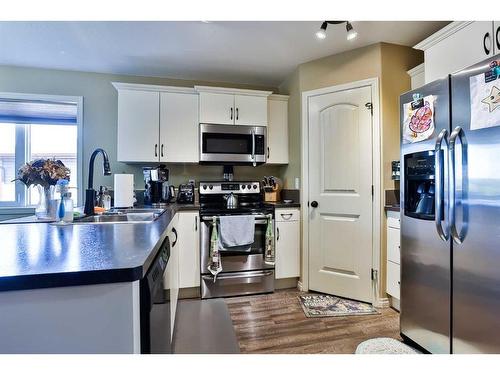 5040 41 Street, Taber, AB - Indoor Photo Showing Kitchen With Stainless Steel Kitchen