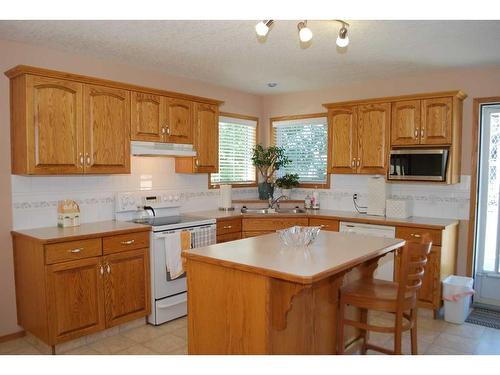 54 Cougar Road North, Lethbridge, AB - Indoor Photo Showing Kitchen With Double Sink