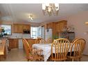 54 Cougar Road North, Lethbridge, AB  - Indoor Photo Showing Dining Room 