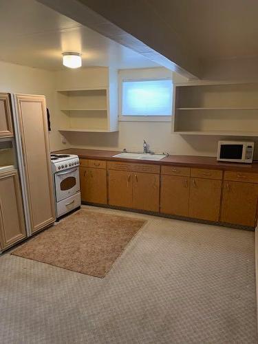 618 19 Street South, Lethbridge, AB - Indoor Photo Showing Kitchen With Double Sink