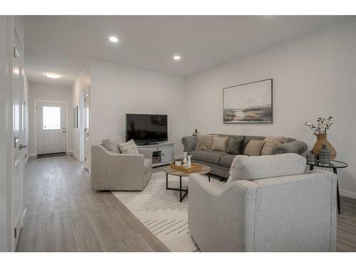 202-1940 Parkside Way, Coaldale, AB - Indoor Photo Showing Living Room