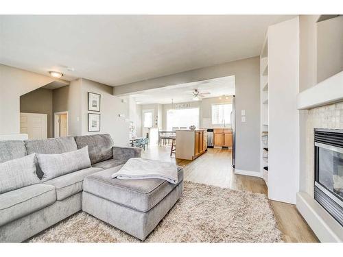 141 Peigan Court West, Lethbridge, AB - Indoor Photo Showing Living Room With Fireplace