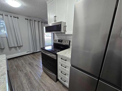 12-3410 23 Avenue South, Lethbridge, AB - Indoor Photo Showing Kitchen With Stainless Steel Kitchen