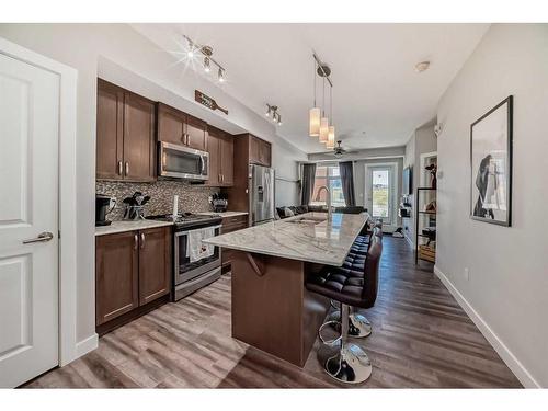 1108-3727 Sage Hill Drive Nw, Calgary, AB - Indoor Photo Showing Kitchen