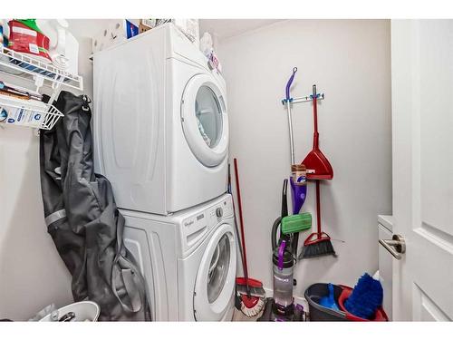 1108-3727 Sage Hill Drive Nw, Calgary, AB - Indoor Photo Showing Laundry Room