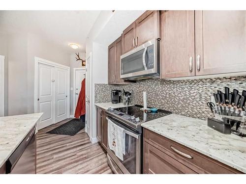 1108-3727 Sage Hill Drive Nw, Calgary, AB - Indoor Photo Showing Kitchen With Upgraded Kitchen