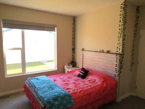 354 Uplands Boulevard North, Lethbridge, AB - Indoor Photo Showing Bedroom