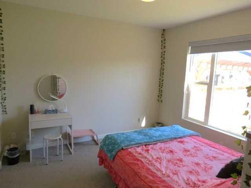 354 Uplands Boulevard North, Lethbridge, AB - Indoor Photo Showing Bedroom