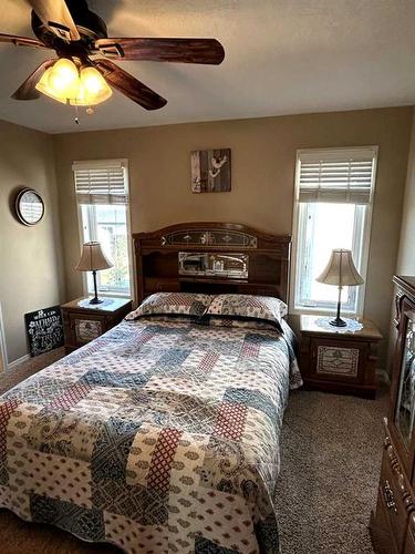 1022 Livingston Way, Pincher Creek, AB - Indoor Photo Showing Bedroom